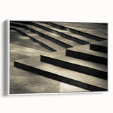 Vintage poster art of a spiral staircase in black and white on a framed canvas, ideal for living room decor.