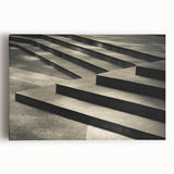Black and white photograph of a spiral staircase on stretched canvas, ideal for kitchen wall art.