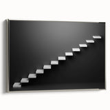 Framed canvas featuring a black and white vintage poster of a spiral staircase.