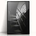 Large abstract wall art featuring a spiral staircase in black and white, framed in acrylic.