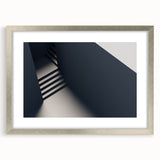 Textured abstract art print of a spiral staircase in neutral shades, framed in silver, ideal for bedroom decor.