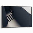 Black and white photo of a spiral staircase on framed canvas, suitable for bedroom wall decor.