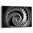 Black and white framed canvas of a spiraling staircase, in a vintage poster style, ideal for bedroom wall art.