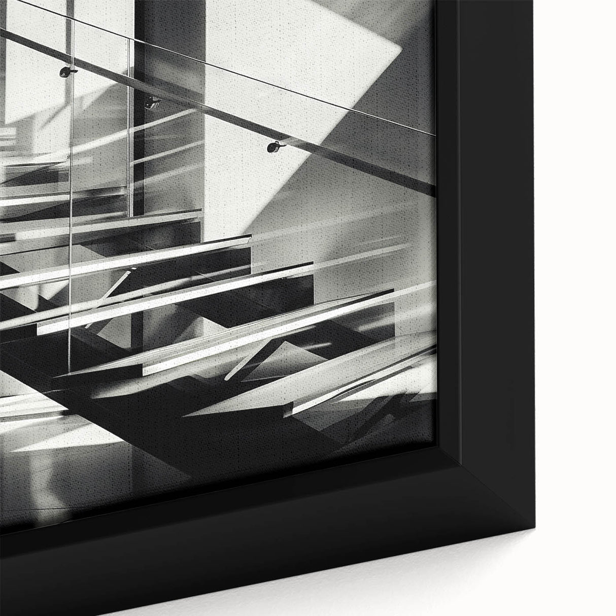 Close-up of a black framed canvas featuring a colorful, textured staircase design.