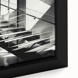 Close-up of a black framed canvas featuring a colorful, textured staircase design.