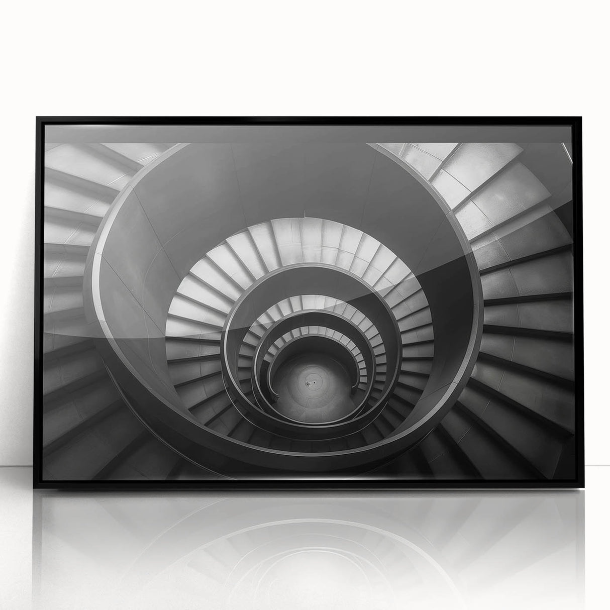 Large abstract wall art featuring a spiral staircase in black and white, framed in acrylic.