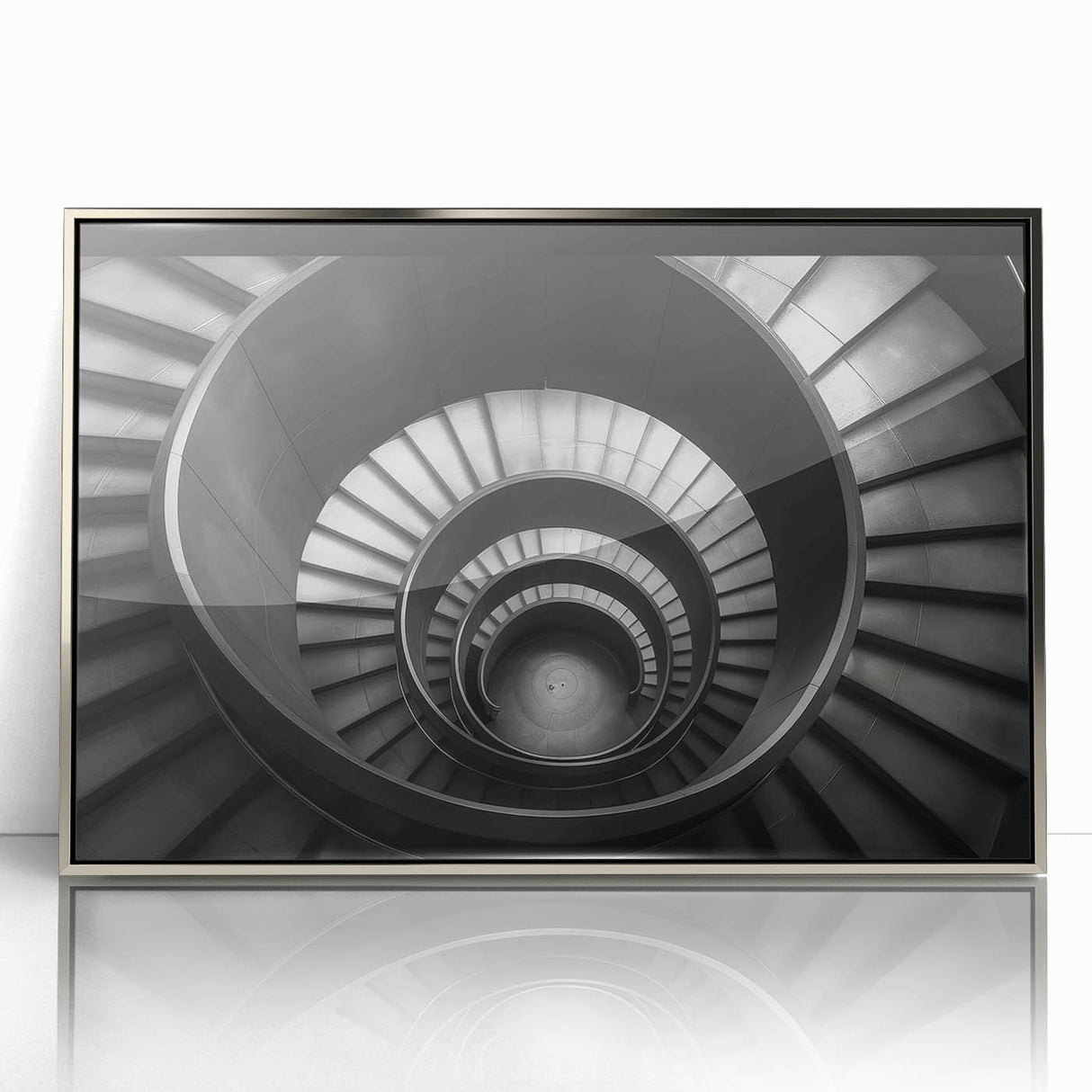 Mid-century modernist art of a spiral staircase in muted grays and silvers, acrylic print framed in silver.