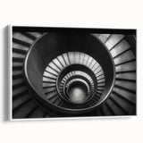 Vintage poster art of a spiral staircase in muted black and white tones on a framed canvas, ideal for living room decor.
