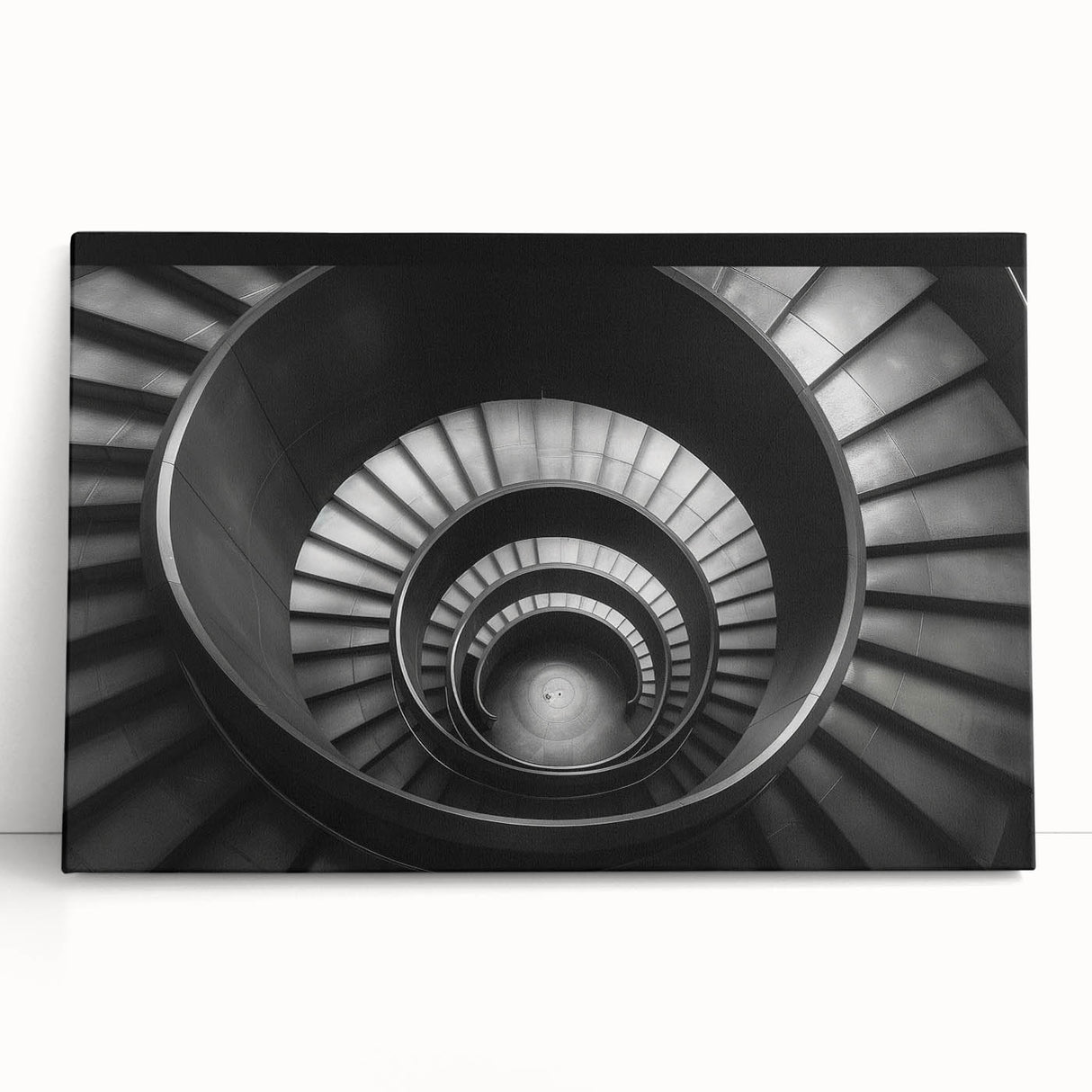Black and white photo of a spiral staircase on stretched canvas, suitable as large art for kitchen or bedroom.