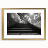 Extra large abstract art print featuring a textured design of spiral staircases in muted gray, framed in gold.