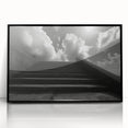 Large abstract wall art featuring a spiral staircase design in black and white acrylic print, framed.