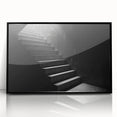 Large abstract wall art of a spiral staircase in black and white, framed acrylic, ideal for modern art wall decor.