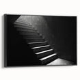 Black and white wall art featuring a spiral staircase design on framed canvas, suitable for bedroom decor.
