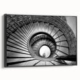 Black and white framed canvas of a spiraling staircase, ideal for bedroom wall decor.