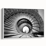 Extra large framed canvas of a vintage poster art depicting a black and colorful spiral staircase.