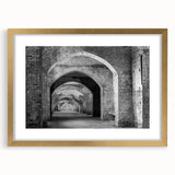 Extra large abstract art print featuring a textured tunnel design in muted earth tones, framed in gold.