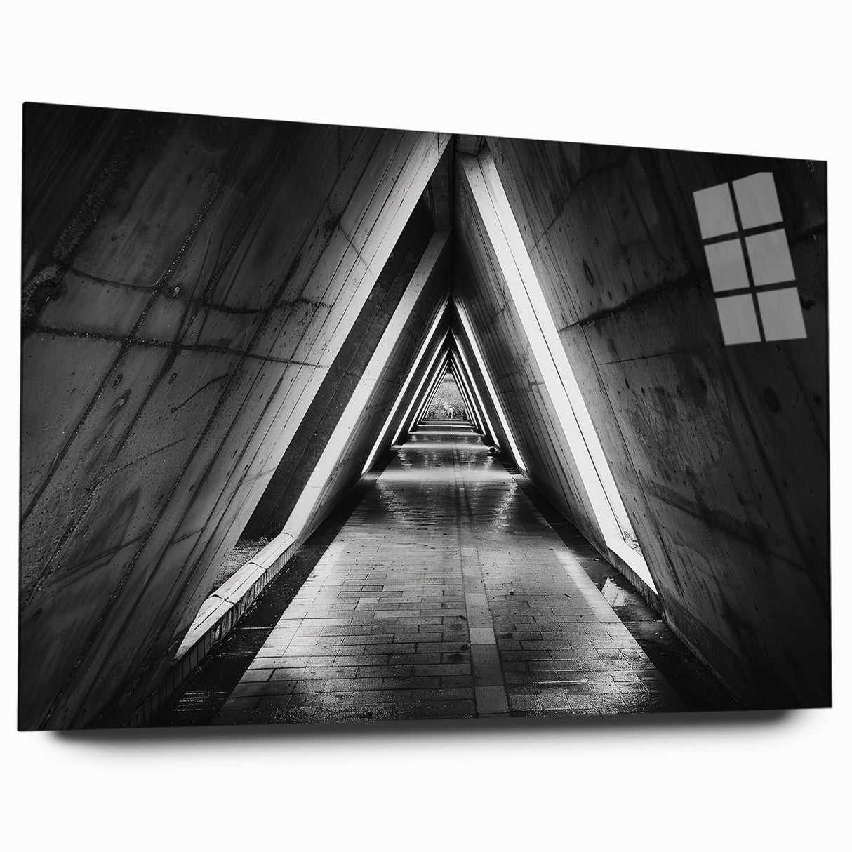 Large abstract wall art on acrylic glass depicting geometric tunnel designs in monochrome shades.