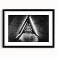 Extra large abstract art print featuring colorful, textured tunnels, framed in black, ideal for living room decor.
