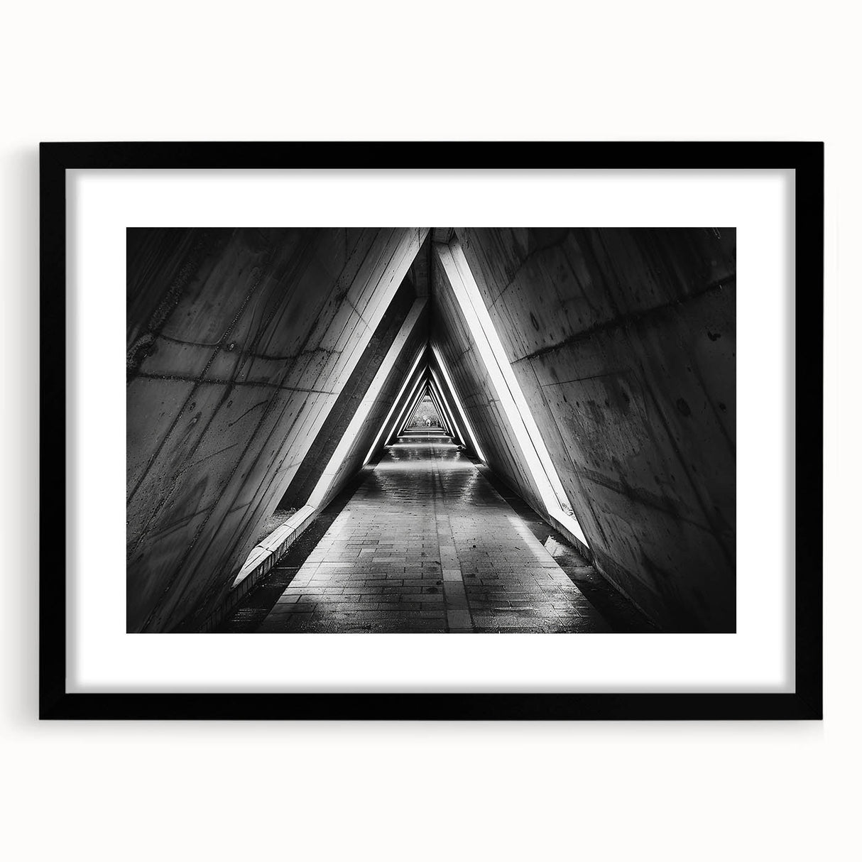 Extra large abstract art print featuring colorful, textured tunnels, framed in black, ideal for living room decor.