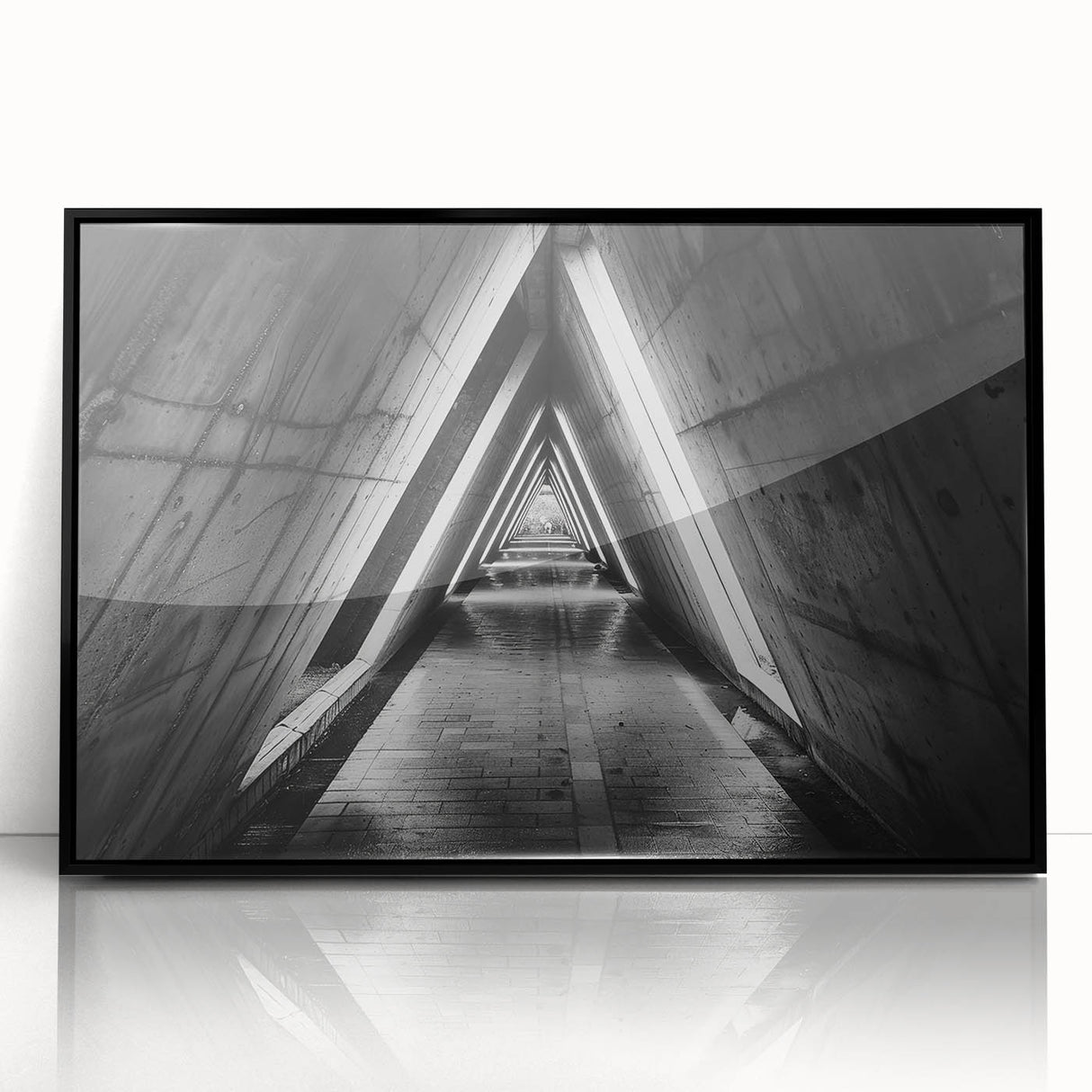 Large abstract wall art depicting geometric tunnels in black and white, framed in acrylic.