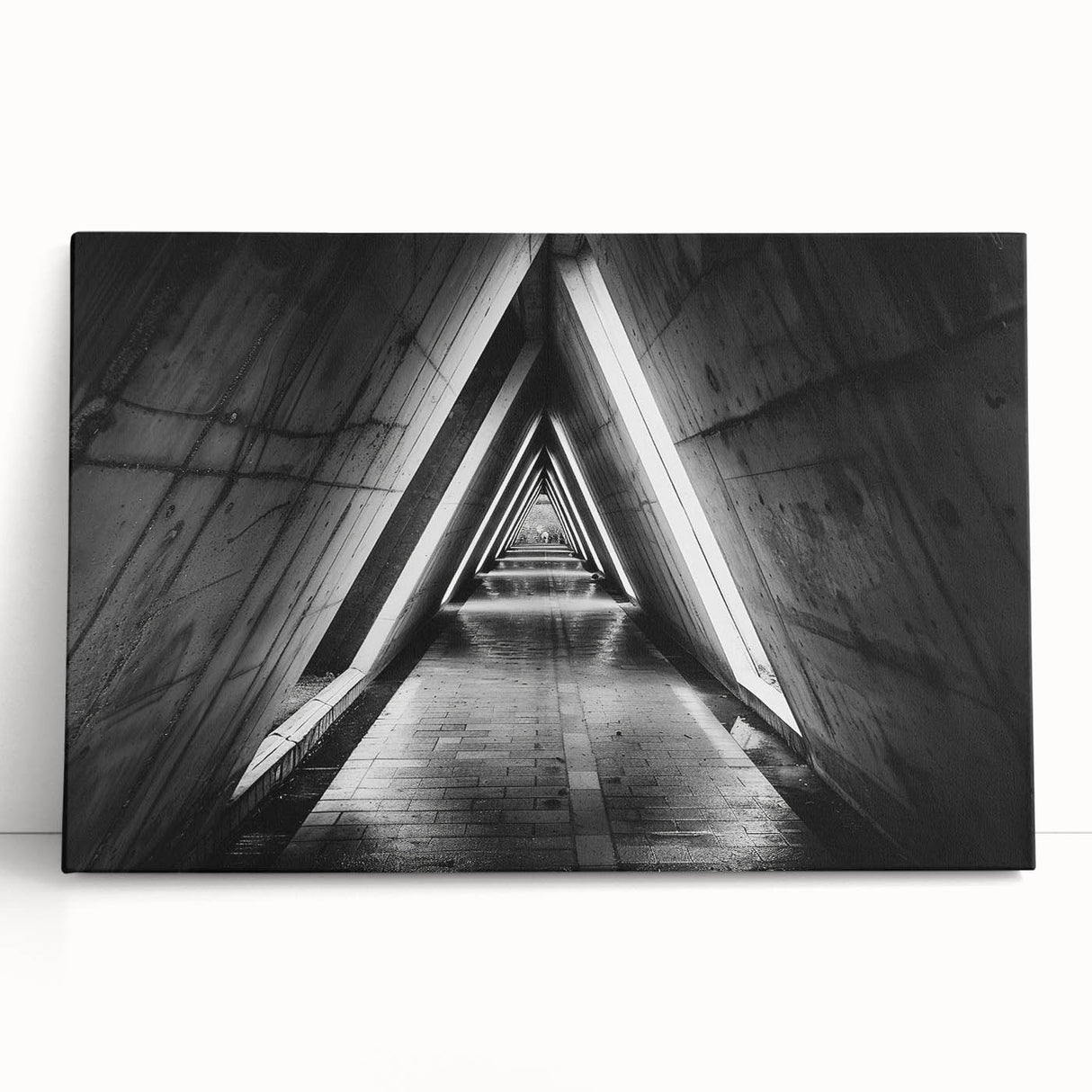 Black and white photo of architectural tunnels on stretched canvas.
