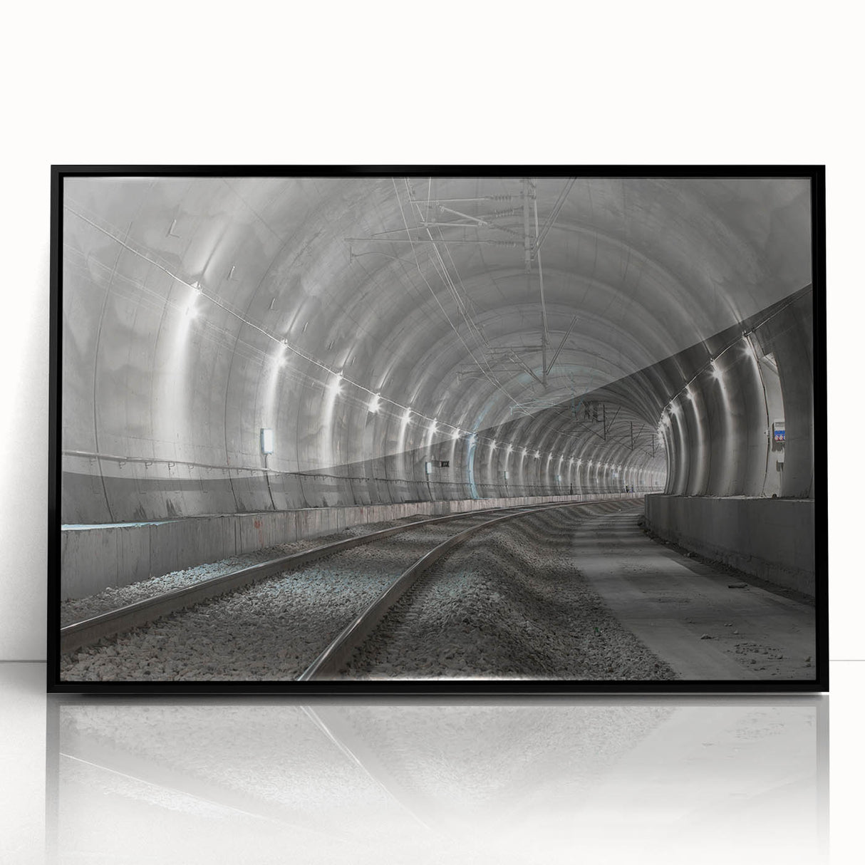 Large abstract wall art featuring a tunnel design in black and gray tones, framed acrylic.