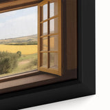 Close-up of black wall art featuring a colorful, textured window design on a framed canvas.