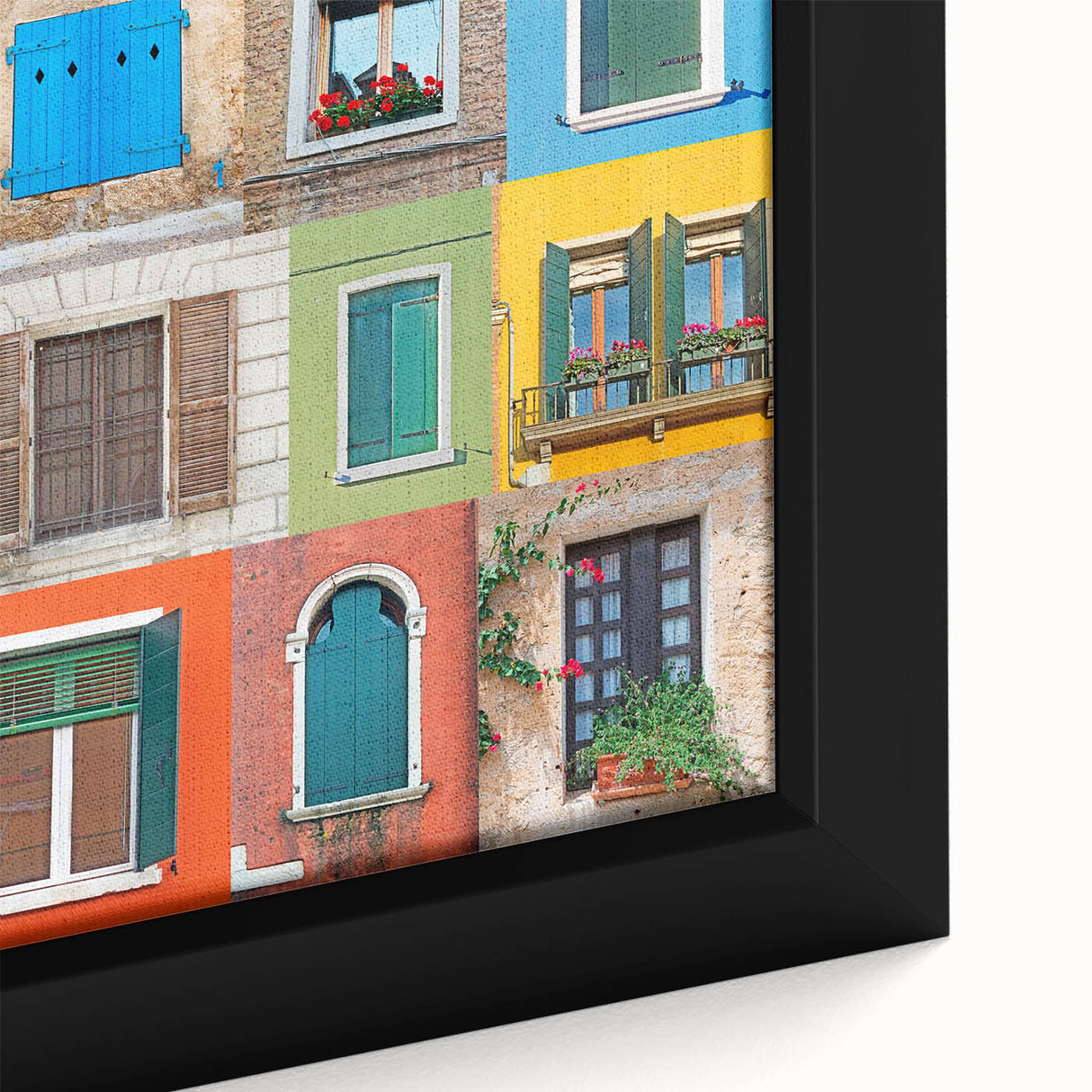 Close-up of black wall art featuring a colorful, textured window design on a framed canvas.