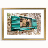 Textured abstract art print featuring a repetitive window design in muted gold and beige tones on a framed canvas.