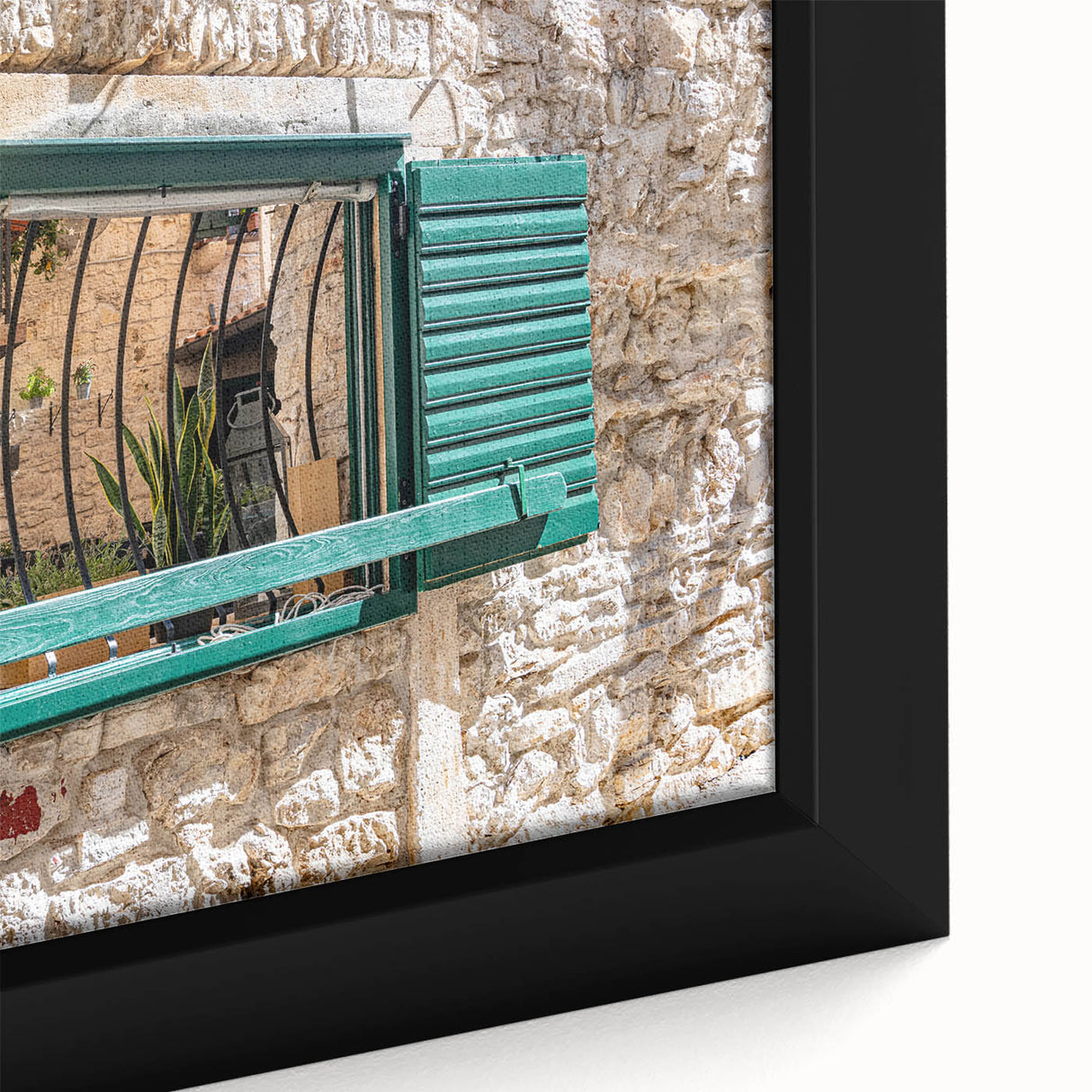 Close-up of black wall art featuring a textured, colorful abstract design on a framed canvas, ideal for living room decor.
