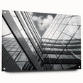 Large abstract wall art on acrylic glass featuring swirling gray and white patterns.