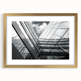 Textured abstract art print in muted gold and cream tones on a framed canvas, suitable for bedroom decor.