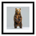 Framed black bear wall art in a sleek black frame with a white mat, showcasing a detailed design perfect for nature-themed decor in modern interiors.