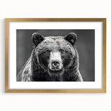 Framed wall art featuring a striking black bear design with a gold mat, perfect for nature lovers and home decor enthusiasts, presented in an elegant display.