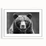 Black bear wall art print framed with a white mat, showcasing a striking black bear design against a clean backdrop, perfect for home decor and nature enthusiasts.