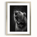 Framed wall art featuring a striking black bear design, elegantly matted and presented in a sleek silver frame, ideal for nature-themed decor.