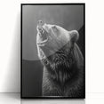 Framed wall art featuring a striking black bear design, showcasing intricate details and vibrant colors, ideal for nature lovers and home decor enthusiasts.