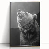 Framed wall art featuring a striking black bear design, showcased in a gold-accented acrylic frame, ideal for nature-themed home decor. Perfect for wildlife enthusiasts.