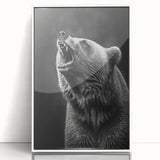 Framed wall art featuring a black bear design, displayed in a white frame with a sleek acrylic front. Ideal for wildlife enthusiasts and modern decor.