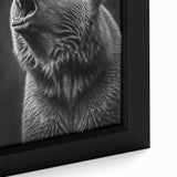 Close-up view of a framed black bear wall art piece, showcasing intricate details and textures of the design, ideal for nature-themed home decor.