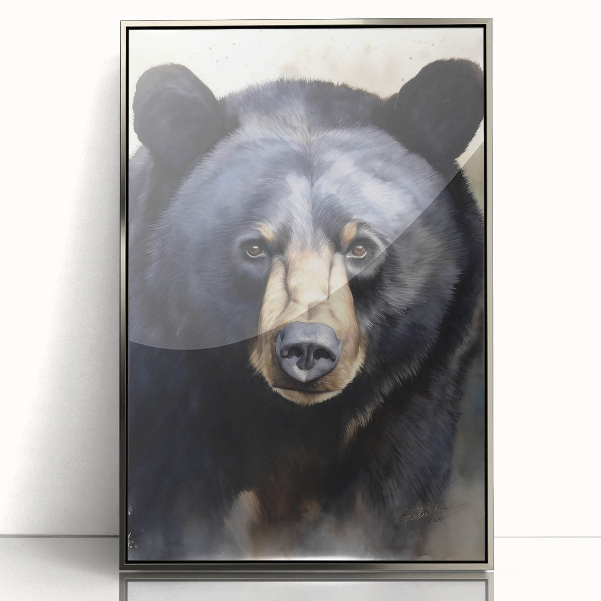 Framed wall art featuring a striking black bear design in a sleek silver frame, showcasing intricate details and vibrant colors, perfect for nature-inspired decor.