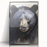 Framed wall art featuring a striking black bear design in a sleek silver frame, showcasing intricate details and vibrant colors, perfect for nature-inspired decor.