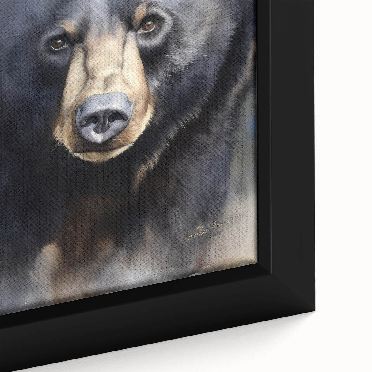 Close-up of a framed black bear wall art piece, showcasing intricate details and textures of the bear's fur against a natural backdrop, ideal for wildlife enthusiasts.