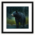 Stylish black bear wall art framed with a matte finish, showcasing a striking design perfect for nature-themed decor. Ideal for home or office settings.