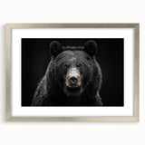 Framed wall art collection featuring a striking black bear design with a silver mat, ideal for nature-themed decor. Perfect for enhancing any living space.