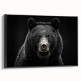 Framed canvas wall art showcasing a black bear design in a modern style, featuring rich black tones and detailed textures, perfect for nature lovers' decor.