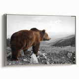 Framed canvas wall art showcasing a brown bear design, featuring a silver frame and side view, perfect for nature-themed home decor. Ideal for wildlife enthusiasts.