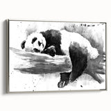 Framed canvas wall art featuring a playful panda bear design, showcasing vibrant colors and a sleek silver frame, perfect for children's rooms or playful decor.