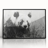 Framed acrylic wall art featuring a playful panda bear design in vibrant colors, perfect for children's rooms or playful decor. The artwork showcases a black frame that enhances its visual appeal, making it a charming addition to any space.