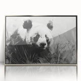 Framed acrylic wall art showcasing a playful panda bear design, featuring vibrant colors and a sleek silver frame, perfect for modern home decor accents.
